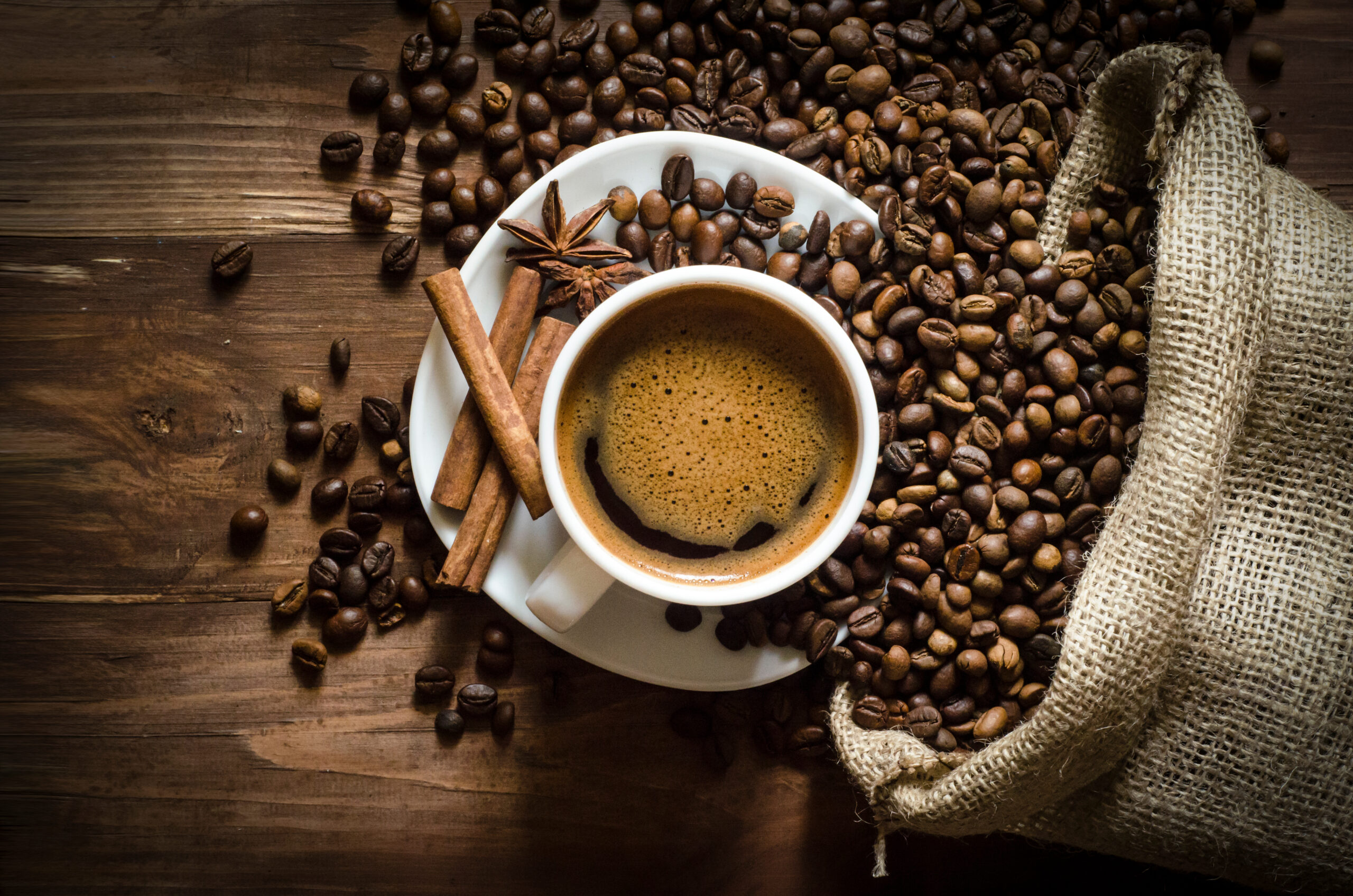 Cup,Of,Coffee,On,Coffee,Beans,Background